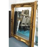 MIRROR, bevelled in ornate gilded frame, 151cm x 119cm.