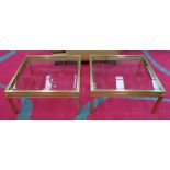 PIERRE VANDEL LOW SIDE TABLES, a pair, with glass on metal frames, 72cm W x 72cm D x 35cm H each.