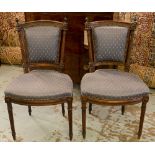 SIDE CHAIRS, a pair, Louis XVI style stained beechwood and woven blue upholstery.