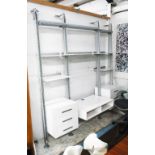 WALL SHELVING, by Ligne Roset with open shelves and banks of drawers in white finish,