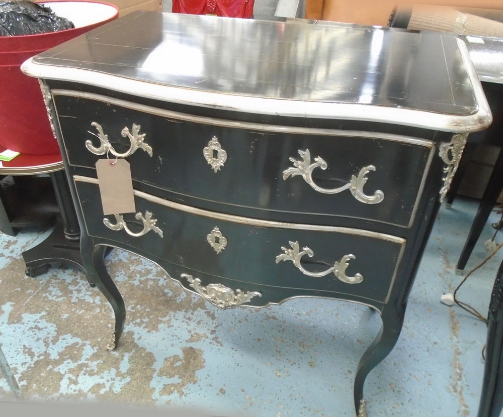 BLACK COMMODE, silver gilt detail, two drawers, metal mounts, 87cm W x 52cm D x 93cm H.