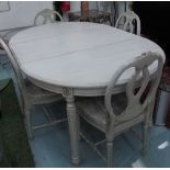 DINING TABLE, grey painted with leaves and four chairs to match, approx.