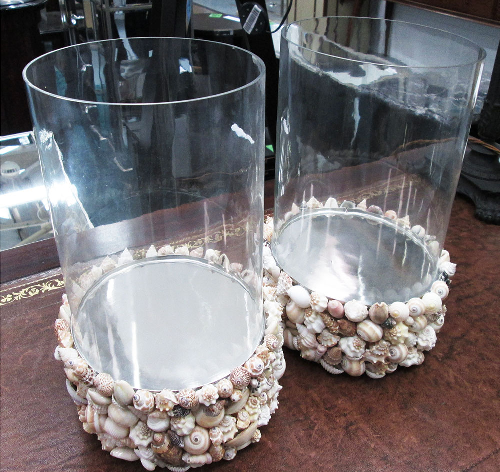 STORM LANTERNS, a pair, circular glass with shell encrusted base, each 19cm W x 29cm H.