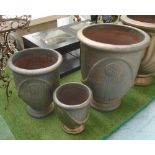 GLAZED PLANTERS, a set of three, French style, bronze patina, 80cm H x 70cm W,
