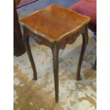 OCCASIONAL TABLE, early 20th century French rosewood with a shaped top,