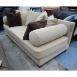 DAYBED, in neutral fabric on block supports with two bolster cushions and six cushions, 191cm L.