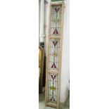 STAINED GLASS PANEL, early 20th century of three narrow sections, 33cm D x 232cm W.