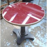 CIRCULAR LAMP TABLE, red top, black column base, 50cm W x 56cm H.