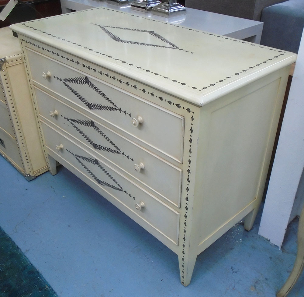 COMMODE, three drawer, cream, Regency style with decorative detail, 110cm W x 50cm D x 85cm H.