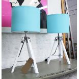 TRIPOD TABLE LAMPS, a pair, white painted wood and chrome bases with duck egg blue drum shades.