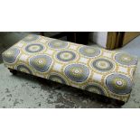 HEARTH STOOL, roundel patterned fabric upholstered, 128cm W x 52cm D.