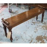 HALL BENCH, Victorian walnut with canted corner top, bolster handles and turned supports, 120cm W.