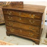 CHEST, George III mahogany with a brushing slide over four graduated drawers and bracket supports,