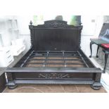 RESTORATION HARDWARE AMERICAN BED, carved wood of huge proportions in an ebonised finish,