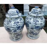 TEMPLE JARS, a pair, in blue and white Chinese style, 43cm H.