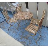 GARDEN SET, five pieces, in cream painted metal consisting of a table, 69cm diam.