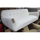SOFA, two seater, button back in cream on turned supports, 187cm L.