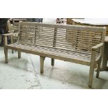 GARDEN BENCH, weathered slatted teak with curved seat, 217cm W.