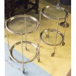 OCCASIONAL TABLES, a pair, brass framed, each with two circular glass tiers on castors,