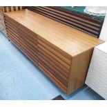 SIDEBOARD, contemporary style, with three cupboards below, on chromed metal supports,