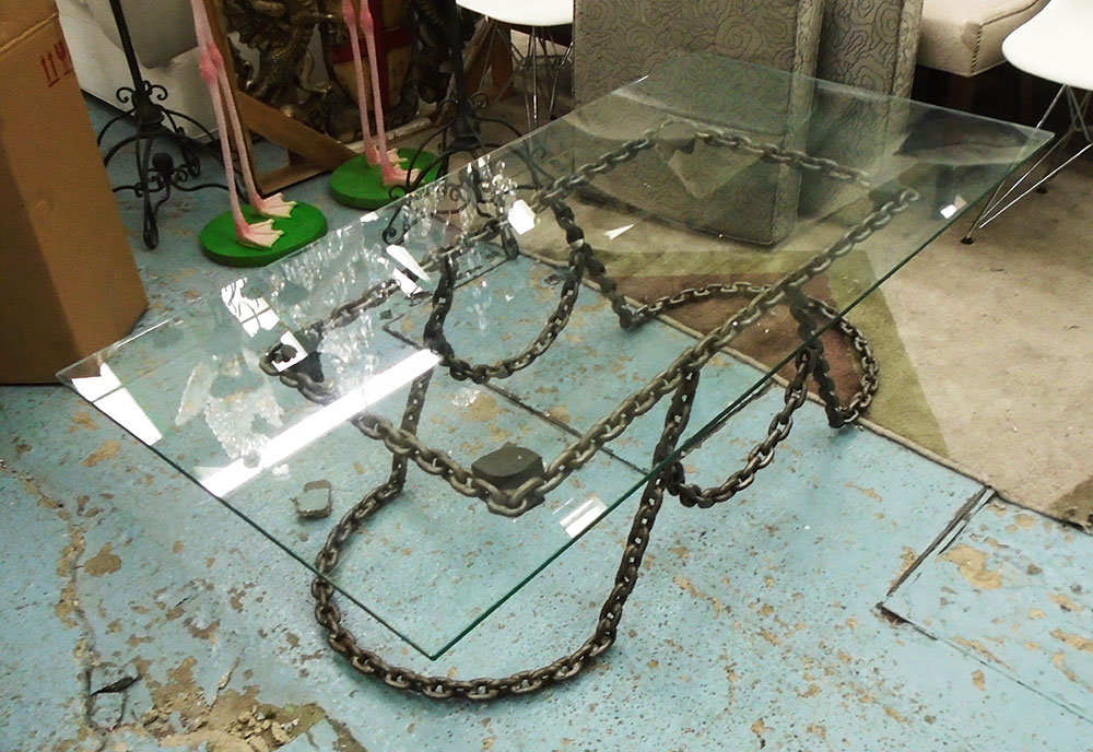 LOW TABLE, rectangular glass top on metal chain base, 150cm L x 80cm W x 45cm H.