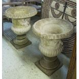 GARDEN URNS, a pair, weathered reconstituted stone,