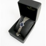DELANCE 'PERFECT TEN' LADIES WRISTWATCH, the stainless steel case set ten small sapphires,