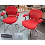 HERMAN MILLER 'EQUA' OFFICE CHAIRS, a pair, stamped and dated 1989, in red fabric, on sled-base.