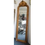 MIRROR, bevelled plate, Louis XV style in a gilded frame, 216cm x 64cm.