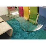 GLASS TABLE, of curved shaped form, and four low curved low chairs in alcantara,