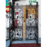 WROUGHT IRON GATES/SCREEN, a pair, each two fold in a verdigris finish, each panel 55cm D x 208cm H.