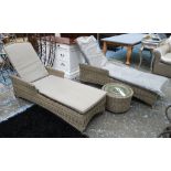 GARDEN LOUNGERS, a pair, by Bramblecrest with cushions and a side table, each 180cm L x 70cm W.