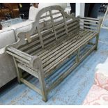 MARLBOROUGH/LUTYENS GARDEN BENCH, in weathered teak on square supports, 196cm L.