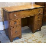 NAVAL DESK, 19th century mahogany and ebony with banded top above one long and four small drawers,