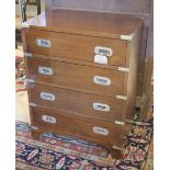 CHEST, campaign style mahogany and brass bound with four long drawers, 60cm W x 38cm D x 77cm H.