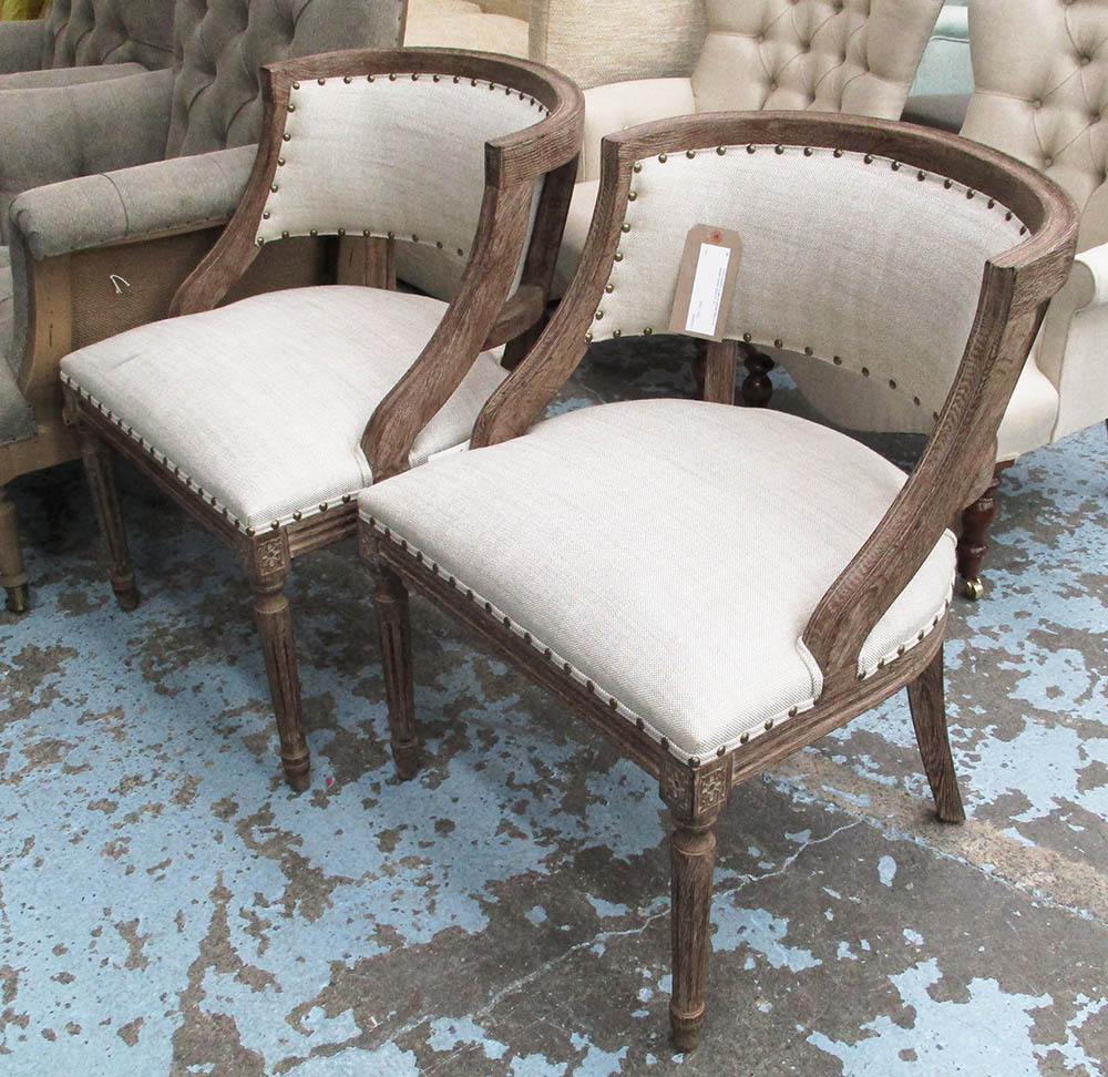 EASY CHAIRS, a pair, in neutral fabric on a wooden frame, 60cm W.