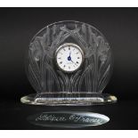 LALIQUE TABLE CLOCK, the surround moulded a design of bullrushes, 20cm x 17cm H max.