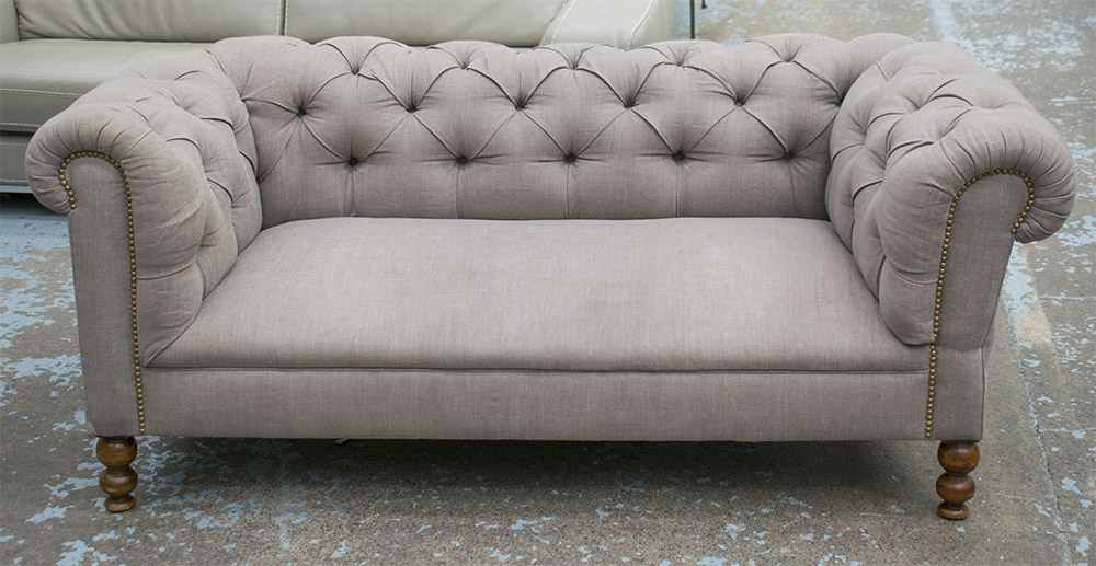 DROP END SOFA, early 20th century and later beechwood in buttoned grey fabric,