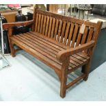 GARDEN BENCH, in slatted teak on square supports, 150cm L.