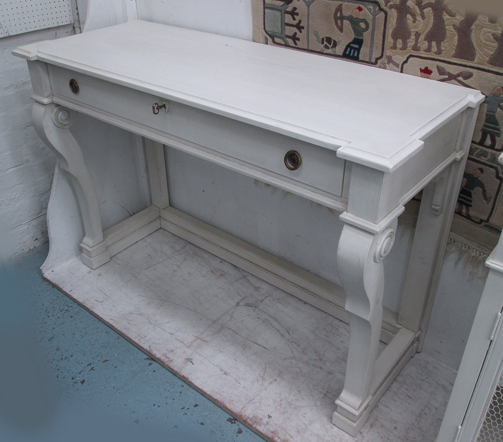 CONSOLE TABLE, cream painted with a frieze drawer, 133cm W x 52cm D x 92cm H.