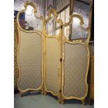 FLOOR STANDING FOLDING SCREEN, Louis XV style three fold cream and gilt with scroll,