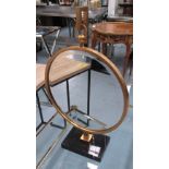 DRESSING MIRROR, circular on a gilded metal and marble frame, 77cm H.