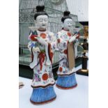 CHINESE FIGURES, a pair, ladies holding vases, 39cm H.