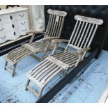 SUN LOUNGERS, a pair, in weathered teak, by Laidleys, 161cm L.