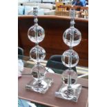TABLE LAMPS, a pair, Art Deco lead crystal ball style on square crystal bases, 57cm H.