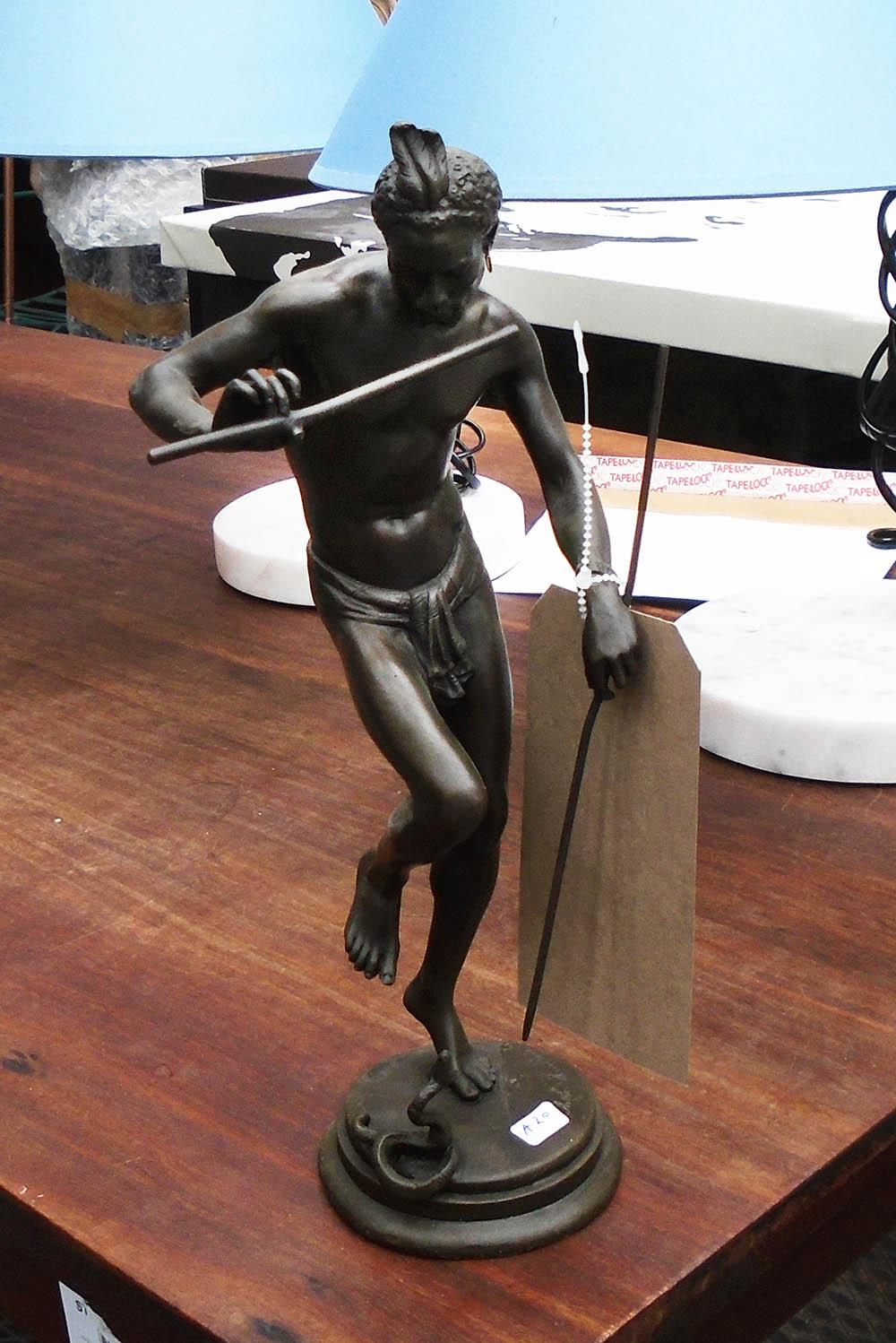 BRONZE FIGURE, man with a snake, 34cm H.