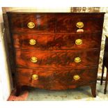 BOWFRONT CHEST, Regency flame mahogany with two short and three long drawers,