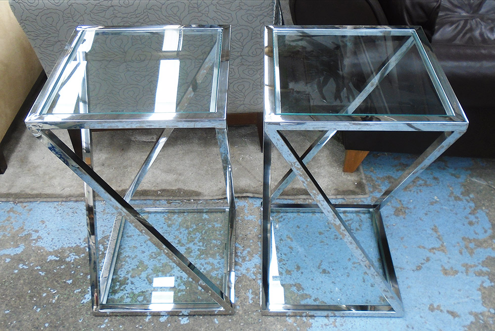 SIDE TABLES, a pair, with glass top and shelf below on chromed metal bases, 40cm x 40cm x 70cm H.