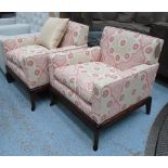 ARMCHAIRS, a pair, pink patterned fabric wooden supports, 77cm x 77cm x 80cm H.