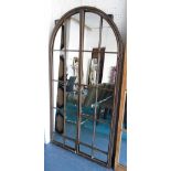 GATED MIRROR, with domed top on a rustic effect metal frame, 170cm x 90cm.